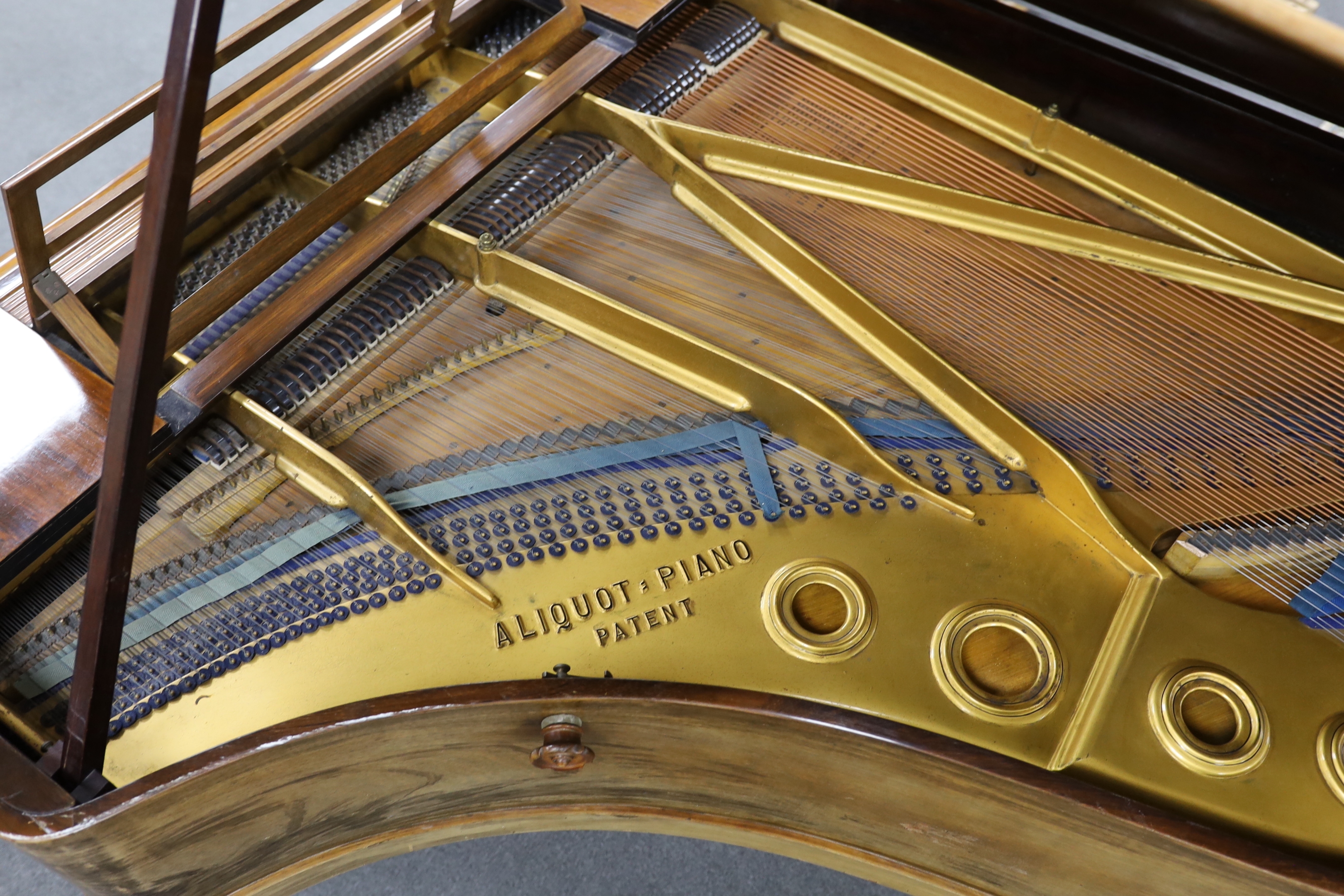 An early 20th century Blüthner rosewood and simulated rosewood Alquot Patent grand piano, Serial No. 72354, width 146cm, length 188cm